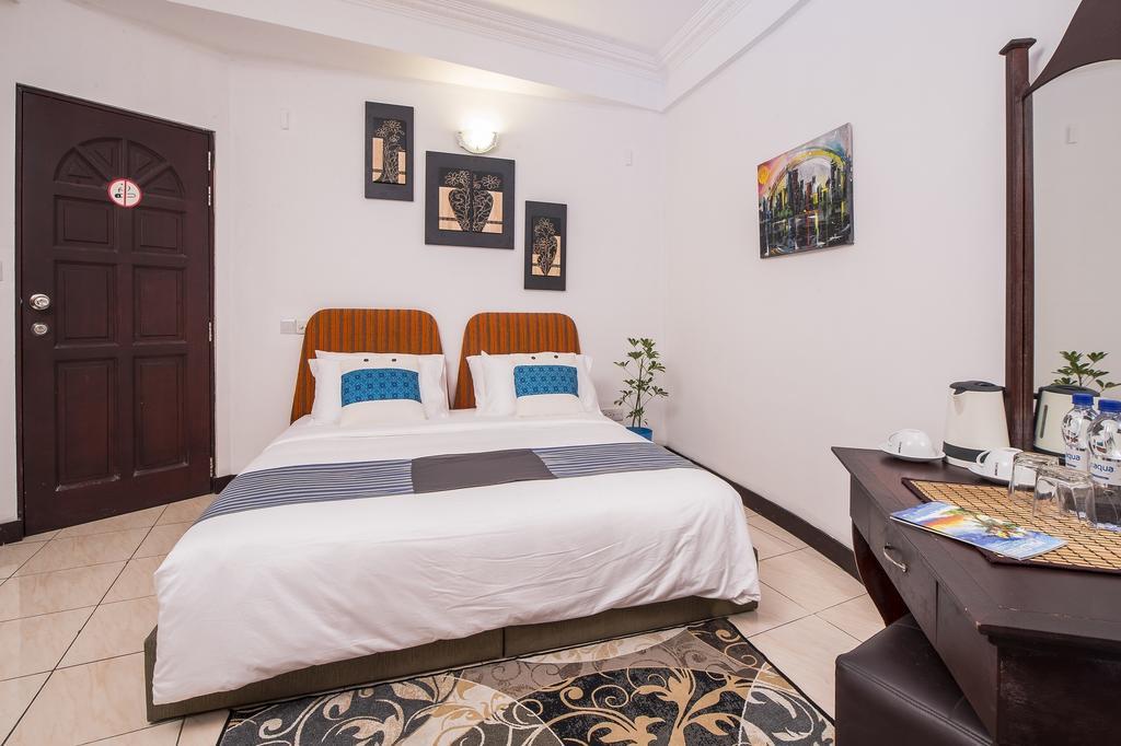 Central Boutique Inn Мале Номер фото
